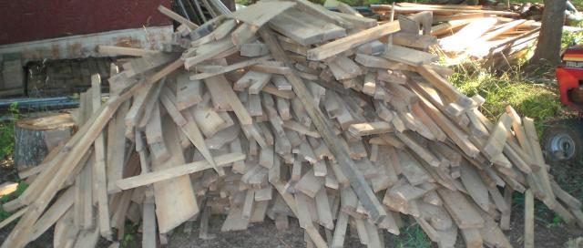 Pile of wood scraps. Mike & Dad's Hauling provides contractor clean up services in Salem OR.
