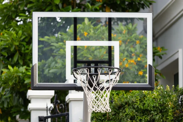 Closeup of a residential basketball hoop, ready for removal in Salem OR.