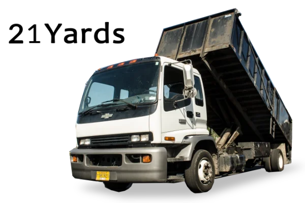 A white commercial cab-over dump truck with its large black dump bed raised for Mike & Dad's Hauling's 21 Yard Truck Loads.