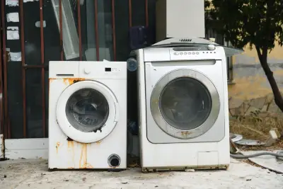 washing machine and dryer waiting on the curb for pick up and hauling in salem OR